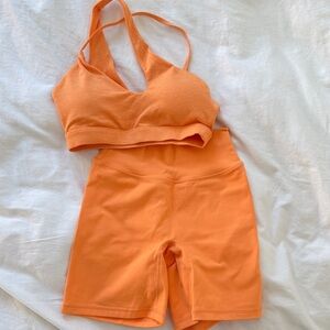 Orange One-Shoulder Sports Bra and Shorts Set